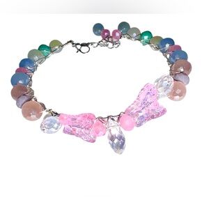 Hand wired bracelet with Czech Glass Butterflies and multiple crystal beads.